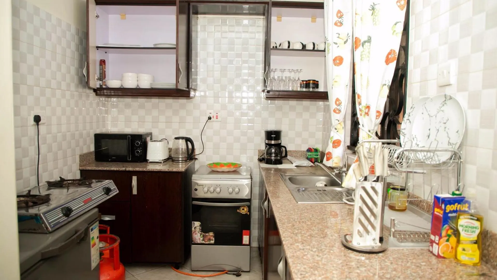 Ie Luxury Apartments Кампала